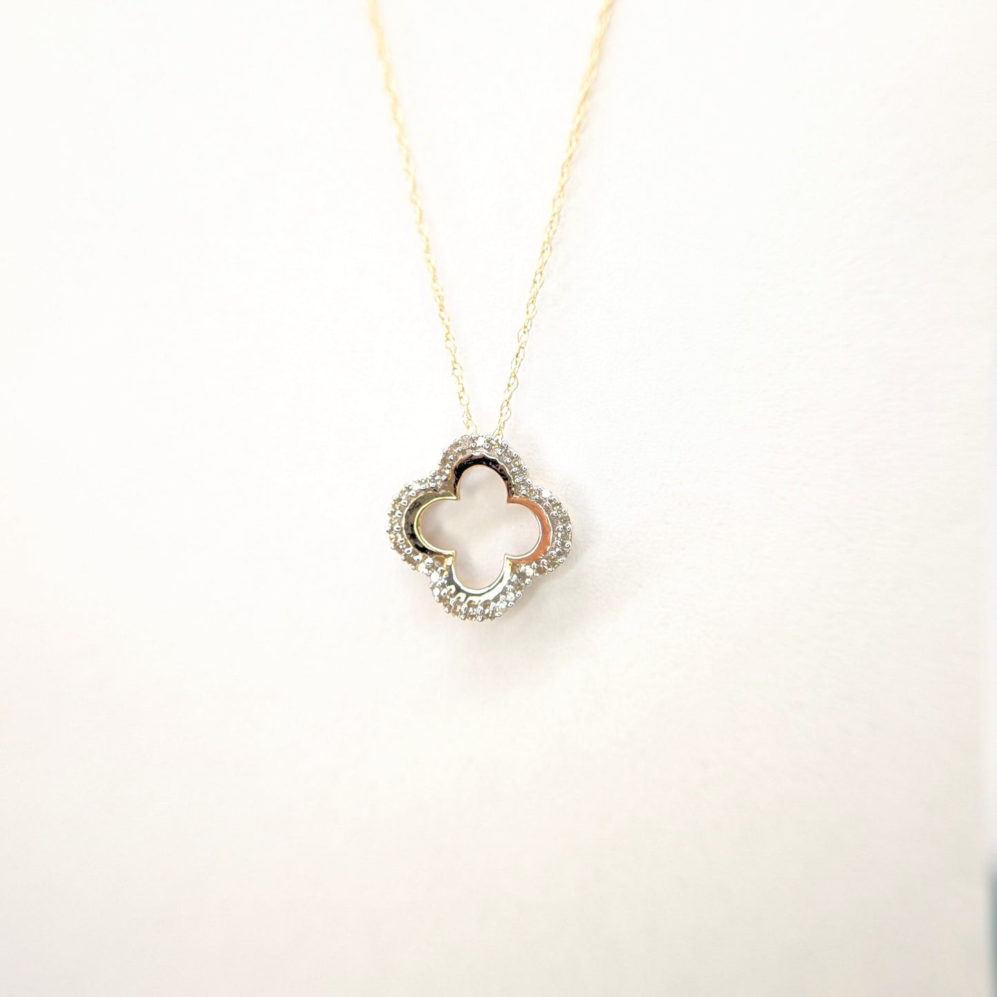 1/8 CTW Natural Diamond Clover Necklace 10k Yellow Gold