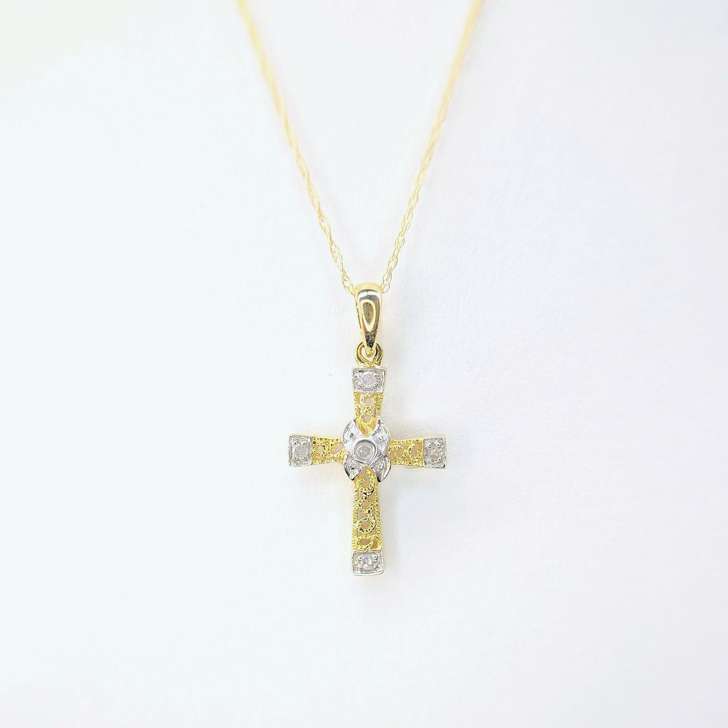 1/20 CTW Natural Diamond Cross Necklace 10k Yellow Gold